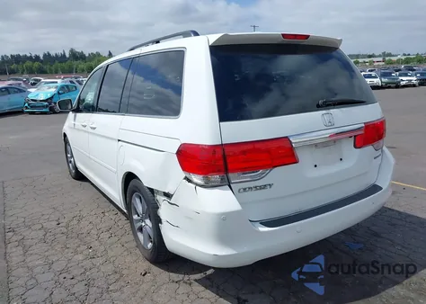 2008 Honda Odyssey Touring z USA, uszkodzony, nr VIN 5FNRL38908B064376